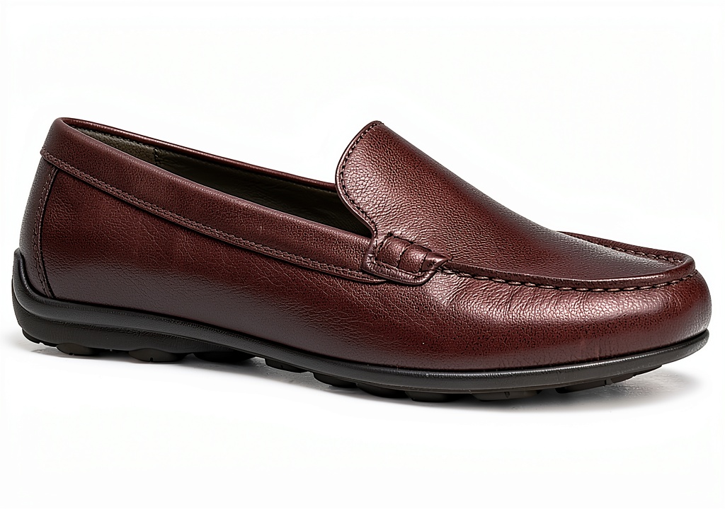 Men's slip-on loafers in Coffee color on a wooden floor