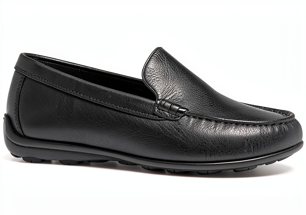 Men's slip on loafers in Black color on a wooden floor